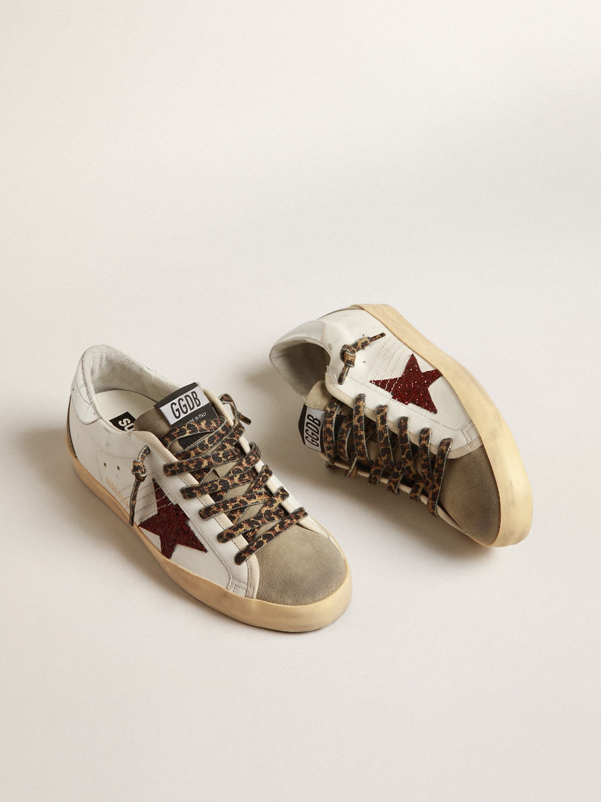 Super-Star with burgundy glitter star and silver heel cap