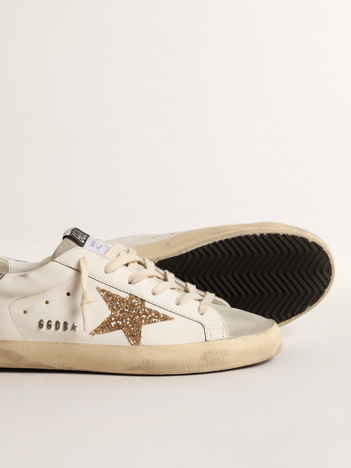 Super-Star women's sneakers with gold glitter star and ice suede inserts