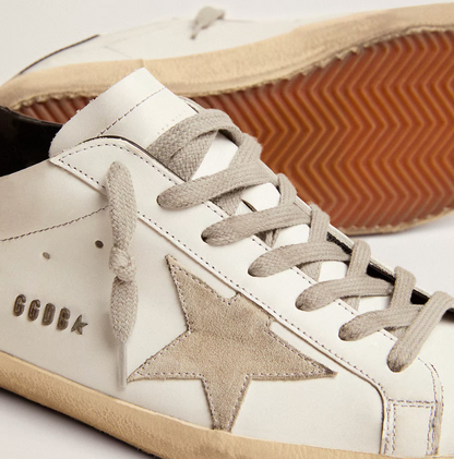 Super-Star with black heel tab and metal studs lettering
